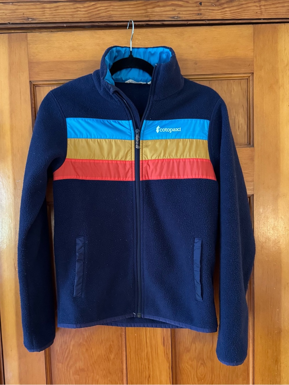Patagonia Navy Fleece Jacket with Blue, Gold & Red Stripes